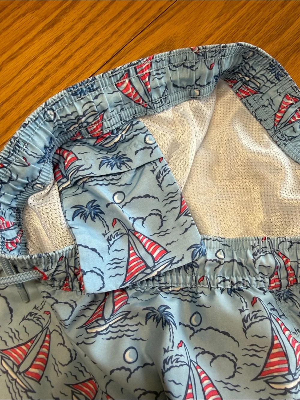 Vineyard Vines Light Blue Sailboat Print Swim Trunks with Red Accents